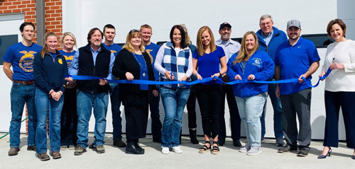 Members of the Sturgeon R-V School Board, Sturgeon Chamber of Commerce and Sturgeon High School FFA Chapter at the recent ribbon cutting of district’s new Ag.-Sciences/ weight-lifting building. Sturgeon R-V photo